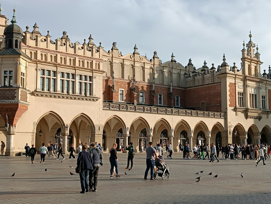 Main Market Square in Krakow with Cloth Hall at golden hour